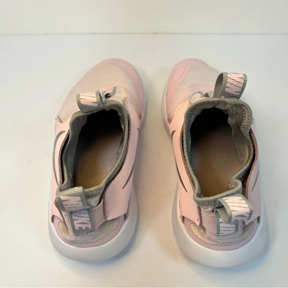 Nike Pink‎ Slip-On Sneakers with Streamlined Design